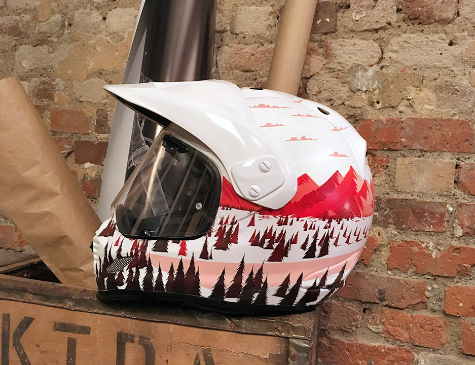 helmet with illustrated landscape 