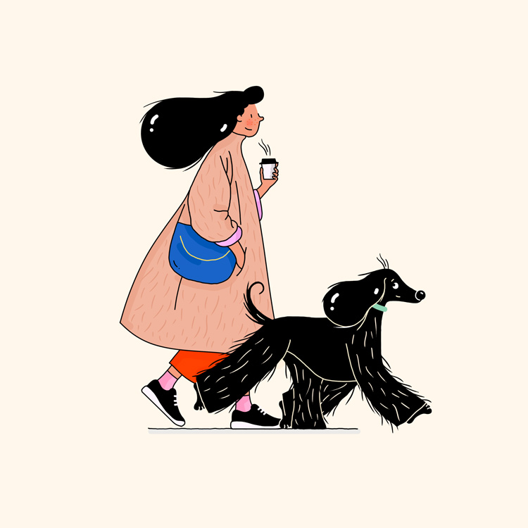 woman on a walk with her dog