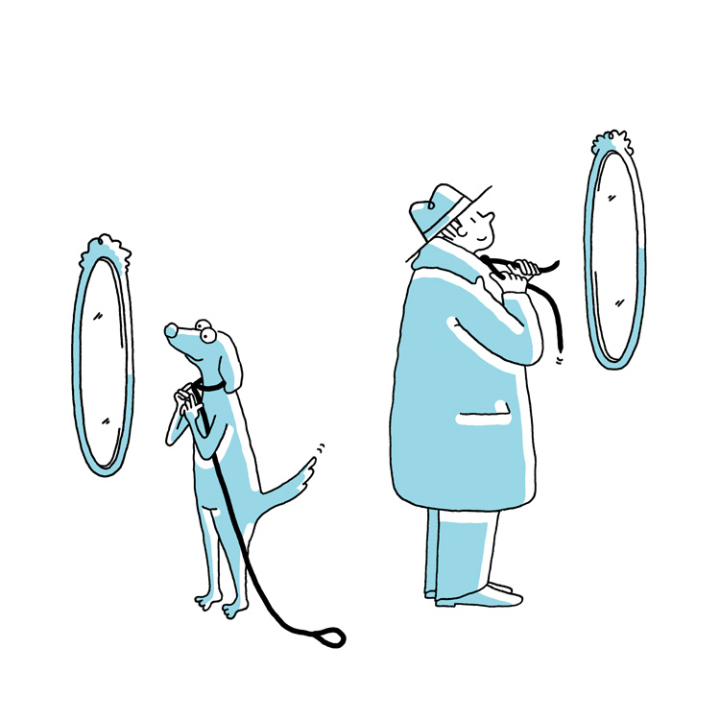 a dog and a man each standing in front of a mirror 