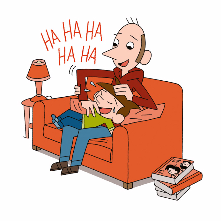 father tickles his son on the sofa