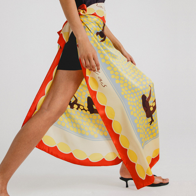 woman wearing designed scarf as skirt 