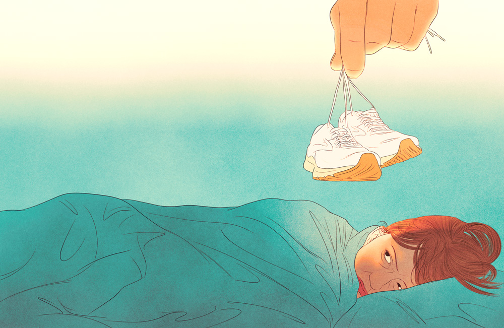 woman lying in bed with running shoes over her head 