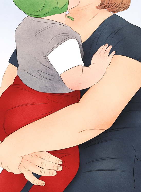 mother holding a baby 