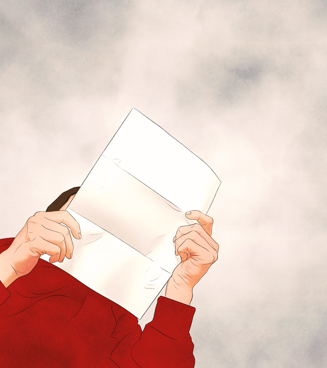 person reading a letter 